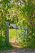 OLD GATE OPENING TO GARDEN