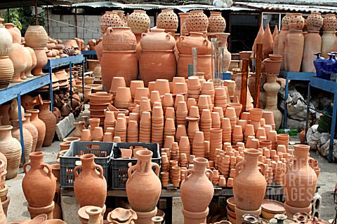 STACKS_OF_TERRACOTTA_POTS_ON_DISPLAY_AT_A_MARKET_STALL_IN_LEBANON
