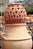 TERRACOTTA POTS ON DISPLAY AT A MARKET STALL IN LEBANON