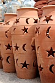 TERRACOTTA POTS ON DISPLAY AT A MARKET STALL IN LEBANON