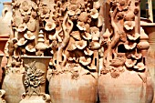 TERRACOTTA JARS ON DISPLAY AT A MARKET STALL IN LEBANON