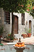 FOUNTAIN IN TRADITIONAL COURTYARD, TALISMAN HOTEL, DAMASCUS