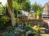 A seating area above a rock garden in a private home in Hawes, Yorkshire Dales