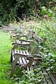 WOODEN BENCHES IN A ROW