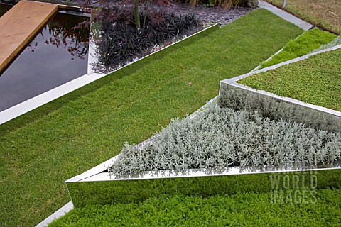 RAISED_BORDERS_AT_CONVERGENCE_OF_THE_ELEMENTS_GARDEN_THE_DOWN_TO_EARTH_PARTNERS_DESIGNED_BY_MATTHEW_