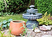 WATER FEATURE AND MIXED PLANTING IN A JAPANESE STYLE GARDEN