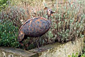 BIRD SCULPTURE ON RAILWAY SLEEPERS