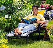 PEOPLE PERSONS ENJOYING BEING RELAXING IN THE GARDEN