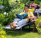 PEOPLE PERSONS ENJOYING BEING RELAXING IN THE GARDEN