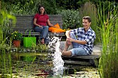 PEOPLE PERSONS ENJOYING BEING RELAXING IN THE GARDEN