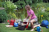 PREPARING BASKET PLANTERS FOR POND