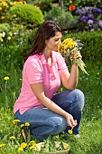 SMELLING PICKED FLOWERS