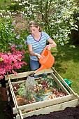 MAKING COMPOST - ADDING WATER