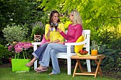 PEOPLE PERSONS ENJOYING BEING RELAXING IN THE GARDEN