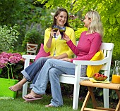 PEOPLE PERSONS ENJOYING BEING RELAXING IN THE GARDEN