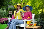 PEOPLE PERSONS ENJOYING BEING RELAXING IN THE GARDEN