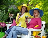 PEOPLE PERSONS ENJOYING BEING RELAXING IN THE GARDEN