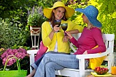 PEOPLE PERSONS ENJOYING BEING RELAXING IN THE GARDEN