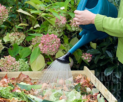 WATERING_COMPOST_HEAP