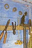 GARDEN TOOLS AND DRIED HERBS IN SHED IN THE VICTORIAN GARDEN,  BBC GARDENS THROUGH TIME HARLOW CARR GARDENS