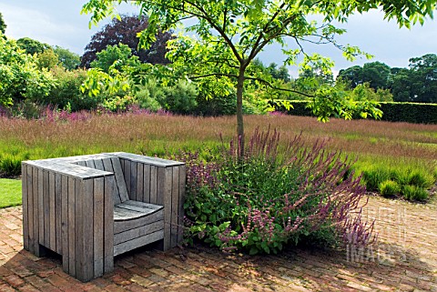 SEAT_IN_THE_DRIFTS_OF_GRASS_GARDEN_IN_SCAMPSTON_WALLED_GARDEN