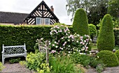 ROSA FANTIN-LATOUR IN THE RILL GARDEN AT WOLLERTON OLD HALL