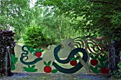 CONTEMPORARY HAND CRAFTED STEEL GATE SCULPTURE OF EVE THE APPLE AND THE SERPENT, GARDEN ART, WITHIN CONWY VALLEY MAZE
