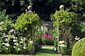 FRONT GARDEN WITH GATES, LONICERA AND LILLIUM REGAL AT WOLLERTON OLD HALL