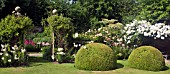 FRONT GARDEN WITH GATES, LONICERA AND LILLIUM REGAL AT WOLLERTON OLD HALL