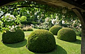 LOOKING FROM LOGGIA WITH OAK ARCHES AND GARLAND OF ROSA FRANCIS E LESTER AT WOLLERTON OLD HALL