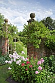 OPEN IRON GATES WITH HONEYSUCKLE AT WOLLERTON OLD HALL