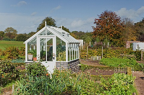 OLD_STYLE_SMALL_WHITE_WOODEN_GREENHOUSE