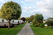 Static caravan holiday park with exclusively privately owned holiday homes set among trees, shrubs and flowers and sweeping well manicured lawns the park is situated minutes from the seaside resorts of Ceredigion