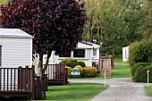 Static caravan park with exclusively privately owned holiday homes holiday set among trees, shrubs and flowers and sweeping well manicured lawns the park is situated minutes from the seaside resorts of Ceredigion