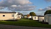 Holiday static caravan park with exclusively privately owned holiday homes set among trees, shrubs and flowers and sweeping well manicured lawns the park is situated minutes from the seaside resorts of Ceredigion