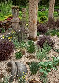 Scree Garden next to patio area under pergola at John Masseys Garden, Ashwood, West Midlands