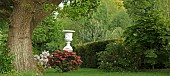 Scenic country garden in late Spring, Conwy Valley Maze, near Dolgarrog in Snowdonia National Park, Gwynedd, North Wales UK,