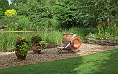 Seating area in garden, deckchair on gravel area