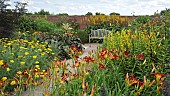 Garden Room called the Lanhydrock Garden with borders of hot colours reds, yellows and orange herbaceous perennials