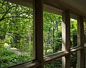 Summer house windows looking out onto garden