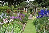 Twin borders of many colours and varieties of herbaceous perrenials