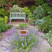 Seating area herbaceous perennial borders circlular slate area