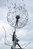 Stainless Steel sculpture of Fairy blowing a dandelion clock