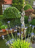 Classic statue and fountain formal canal water feature