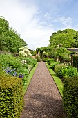 Turf edging between borders and gravel path, borders of herbaceous perennials