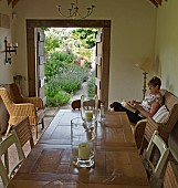 Area of relaxing in summerhouse, looking out onto outstanding gardens