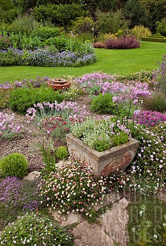 Scree_Garden_leading_to_lawn_with_borders_of_herbaceous_perennials