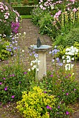 Scented Garden paved path leading to box hedging ornate sundial with butterfly feature