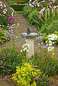 Scented Garden paved path leading to box hedging ornate sundial with butterfly feature