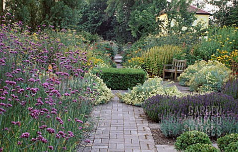 FORMAL_PAVED_GARDEN_WITH_MIXED_BORDER_PLANTING